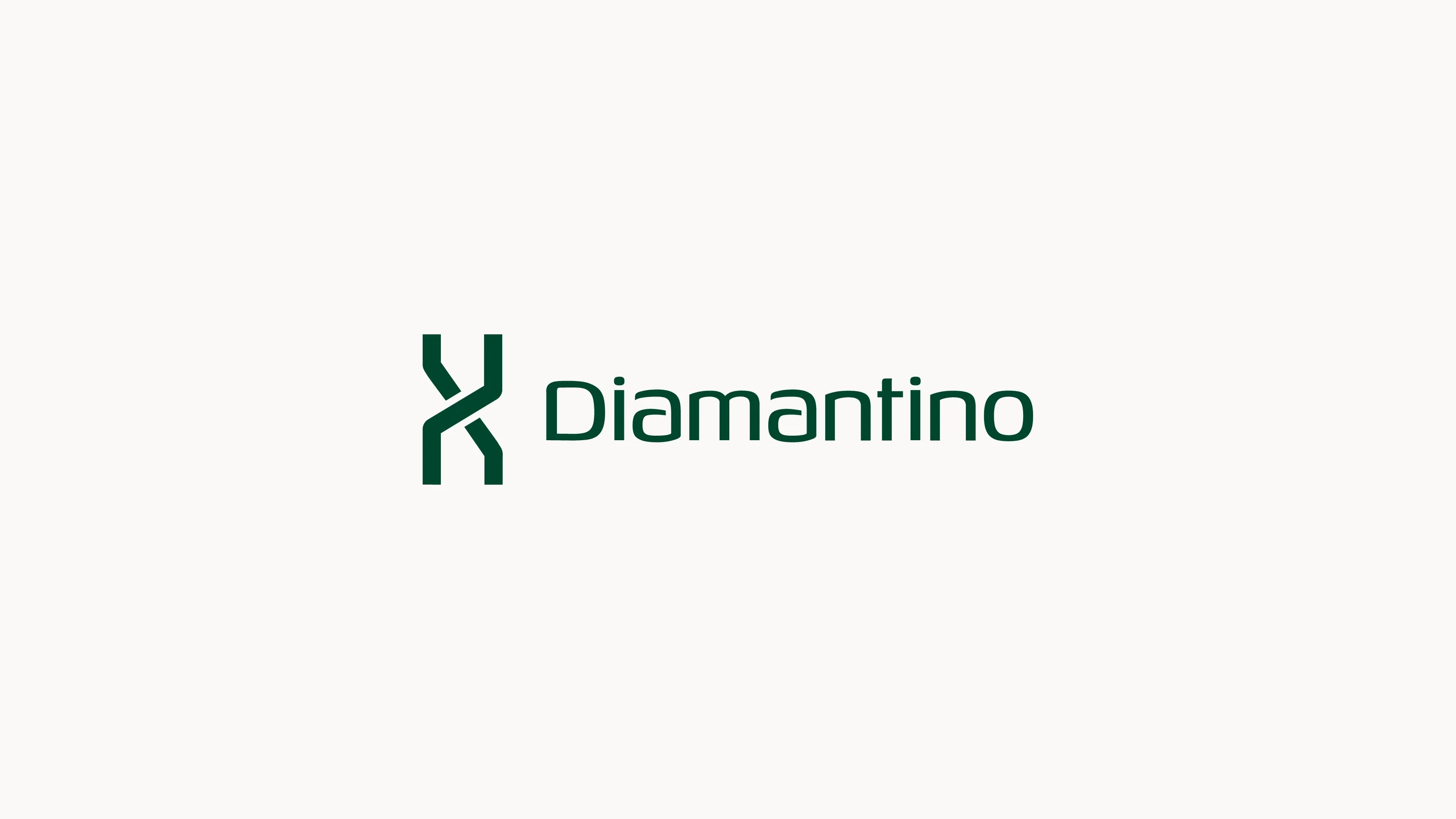 Logotipo Diamantino em verde sobre fundo claro