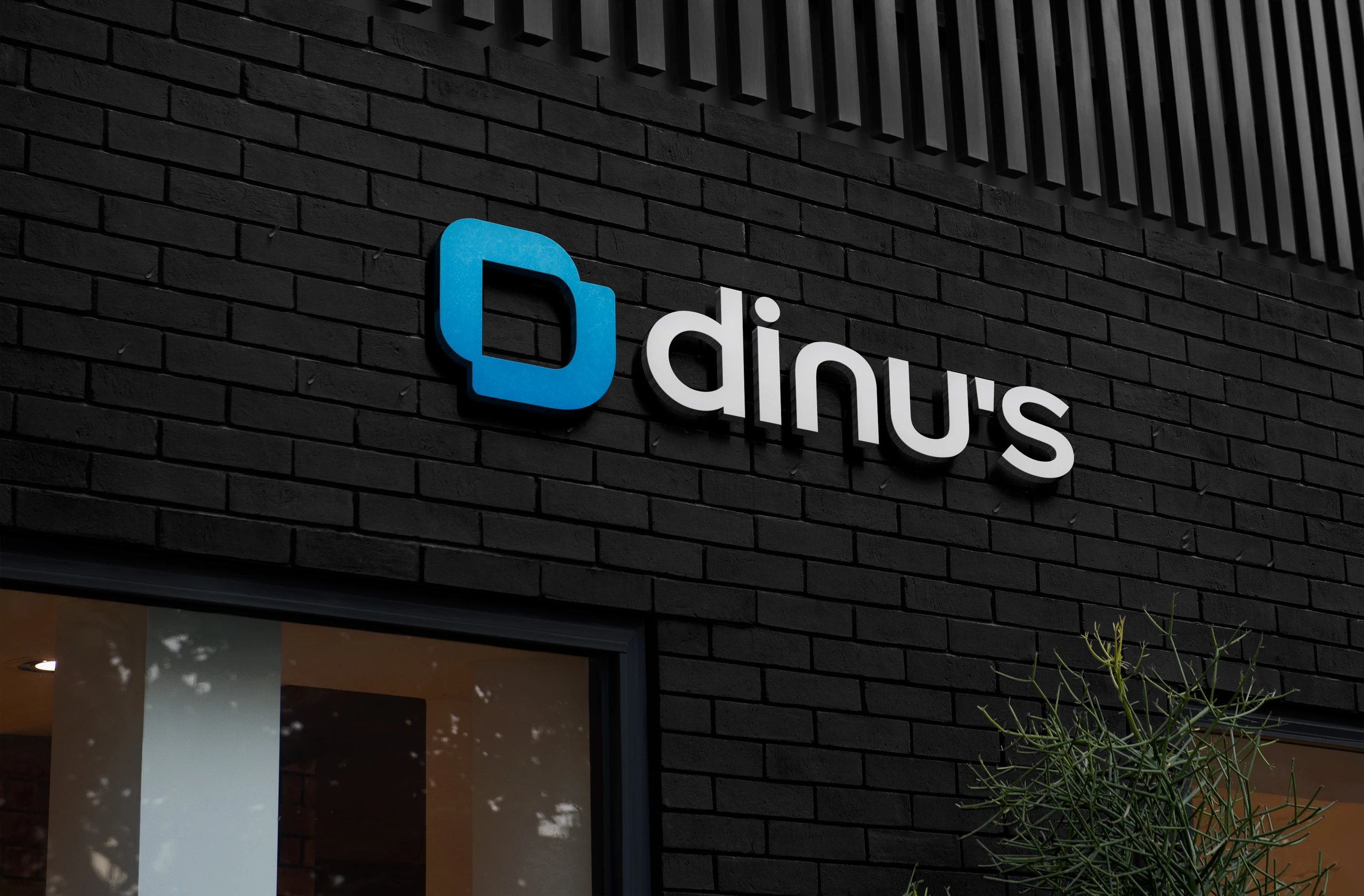 Fachada com o logotipo da DINU’S em volume